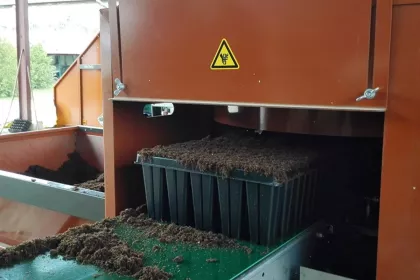 Bigger view of Filling the planting trays with the mixture of substrate and TerraCottem Universal.